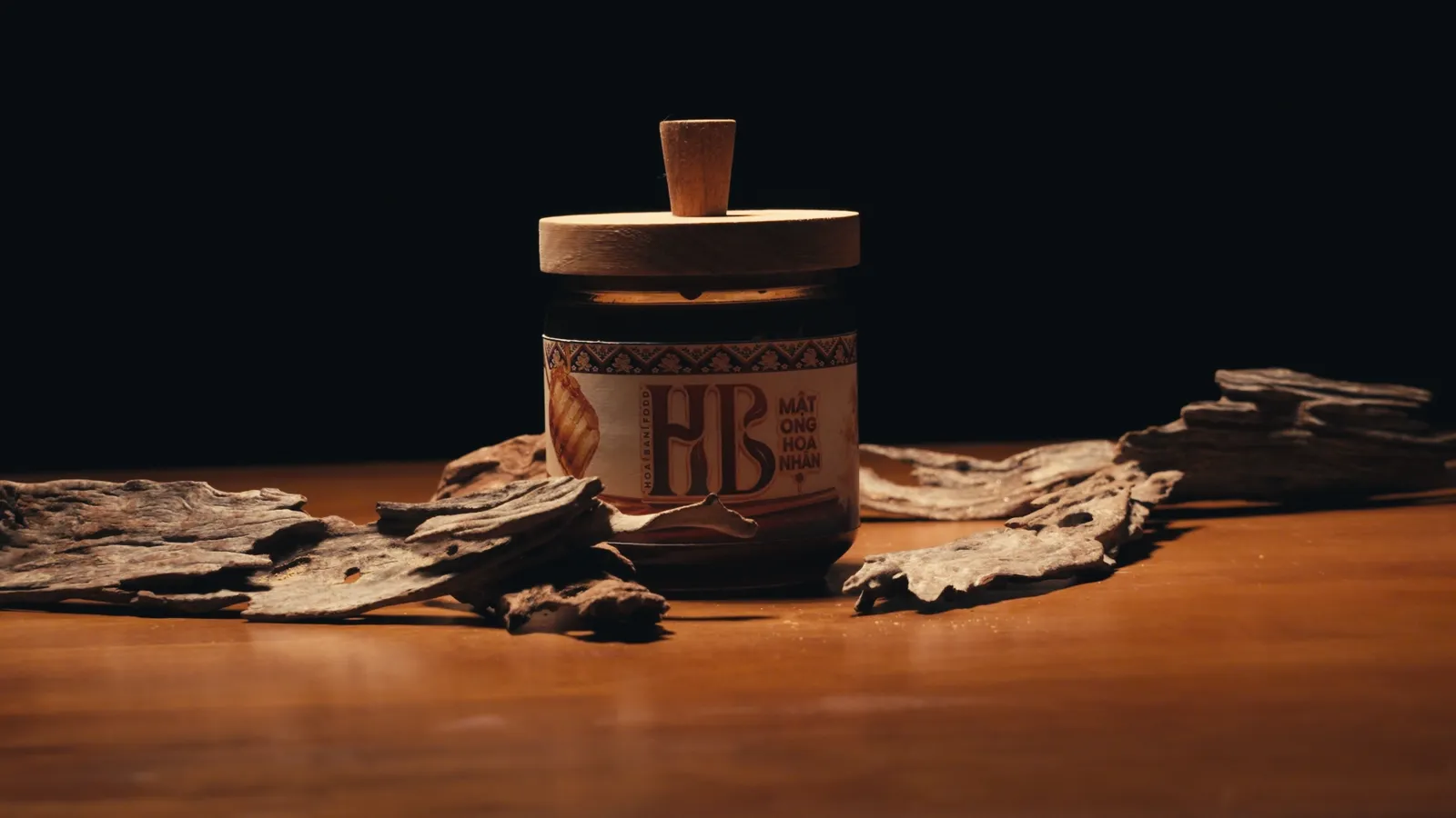An HB jar and the HB letter block on agarwood bark