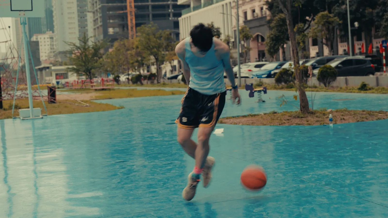A crossover across the empty court