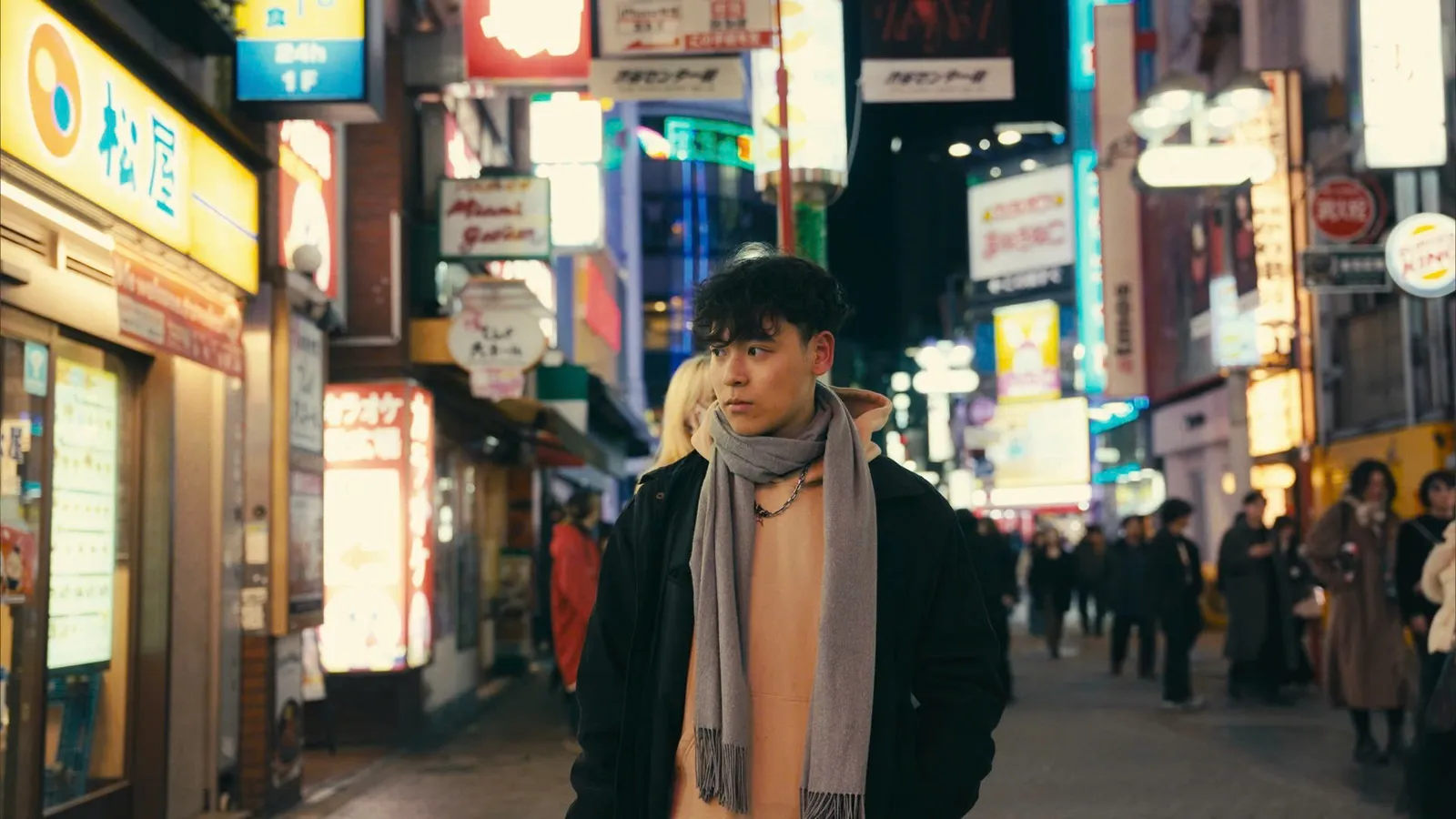 Portrait on a neon street in Tokyo at night